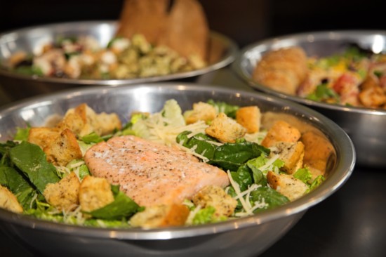 Dress up a classic Caesar salad with fresh salmon.
