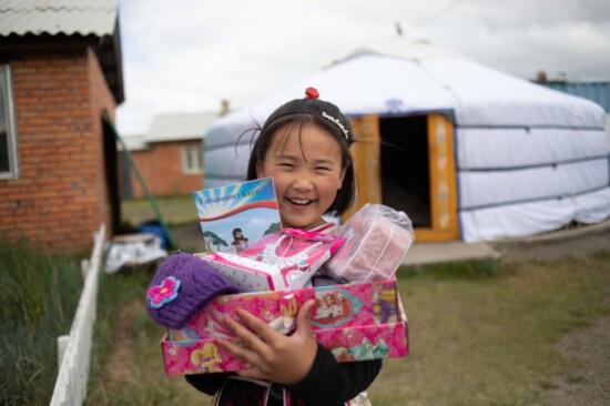 A Operation Christmas Child princess-themed shoebox delights a girl in Mongolia.