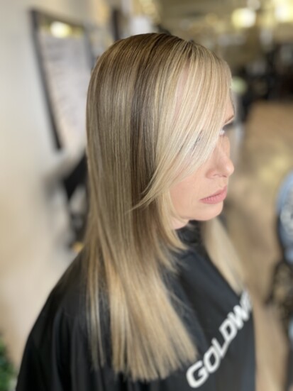 Blonde highlights with bright side band and face framing.