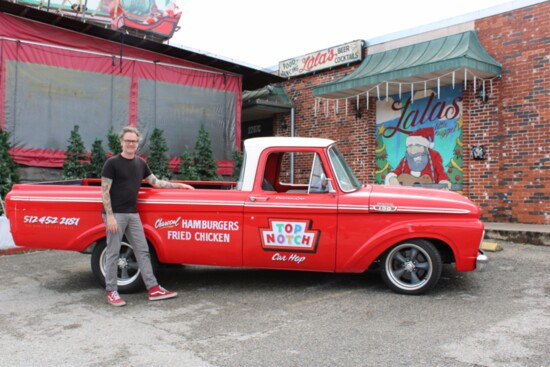 Restaurateur Kelly Chappell with the vintage Top Notch truck outside of Lala's Little Nugget. Image by Julie Royce.   