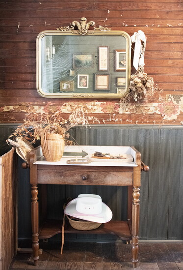 Entryway table with mirror sets the tone as you enter Ida.