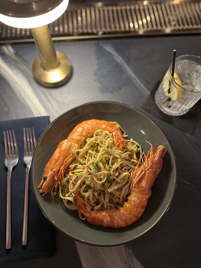 Oak Street Inn & Lounge Head Chef Tyler Craig's favorite linguine aglio olio with Nigerian prawns. 