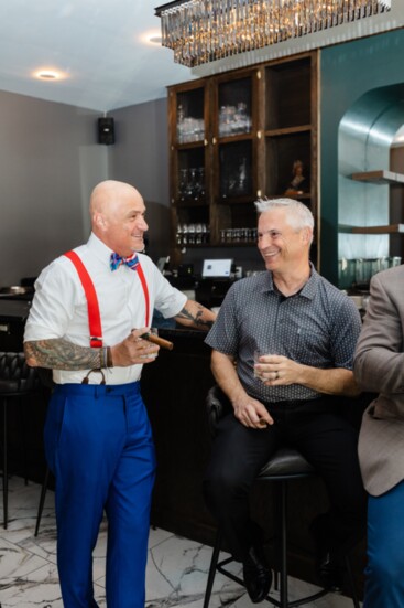 Ron Turner, Theory 5 owner, and Kevin Ard, PA, enjoy conversation at the indoor bar. 