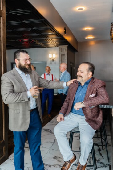 Elier "Albert" Alberto, owner of Rhumba and Danny Minolfo, Realtor enjoy a moment at the bar.