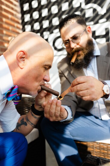 Ron Turner, Theory 5 owner, relaxes with a hand picked cigar by Elier "Albert" Alberto. 
