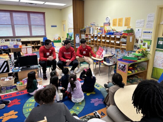 Rutgers Baseball reading to Students on Read Across America Day