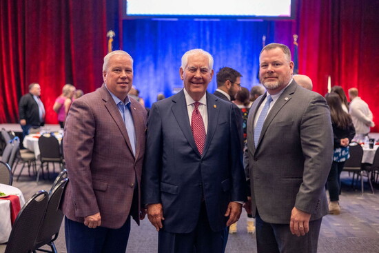 CDO Joe Wiltrout, Rex Tillerson and CEO Chris Mehaffey together at last year's Invest in Character Luncheon.
