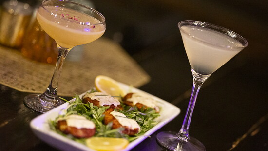 Crispy Lump Crab Cakes are among the tasty appetizers offered at Scratch. Try one of their fresh craft cocktails for an extra treat.