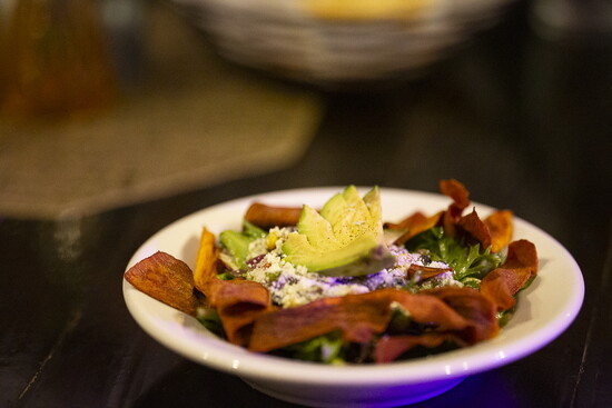 Scratch's Southwest Salad features thinly sliced sweet potato chips with a cilantro lime vinaigrette.