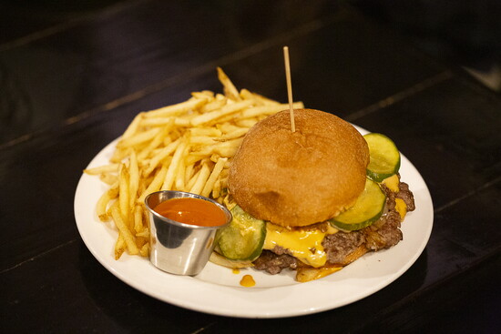 Scratch's Okie Smash Burger features cooked-to-suit beef patties, a special sauce and made-from-scratch read-and-butter pickles.