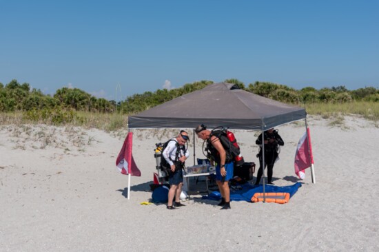 Bring a shade for a base camp. This one was sponsored by Gaspar’s Dive N Board at South Brohard Beach.