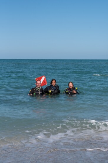 Dive instructor David Brice, Master Scuba Diver Trainer Stephanie Snow, and Divemaster Joni Brice on a shore dive for fossils. 