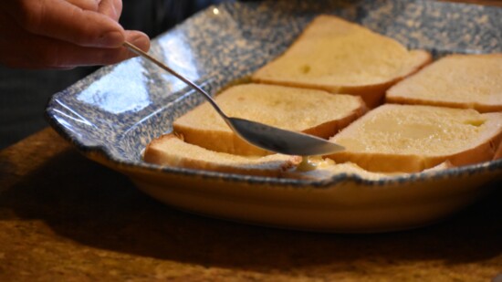 Spoon custard over bread.