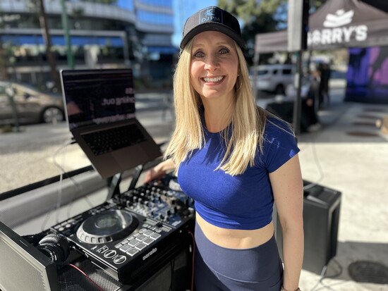 Laura volunteer to DJ at the Momentum event in downtown Walnut Creek in March.