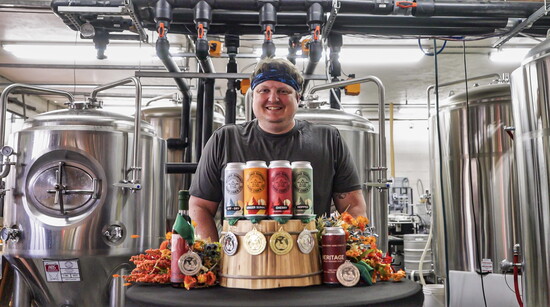 Cidermaker Brandon Baldridge with Ciders and Awards