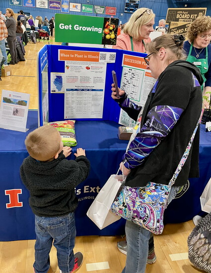 Educational booths provide gardening tips.
