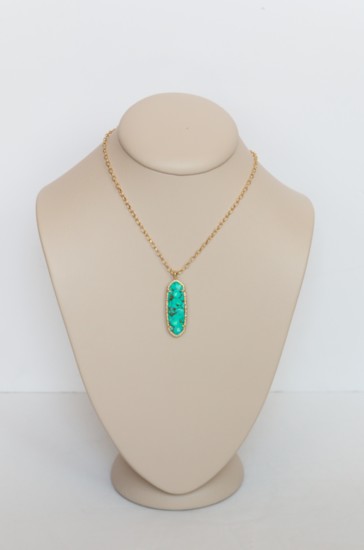 Kendra Scott gold-plated teal stone necklace, $78, Welling & Co.