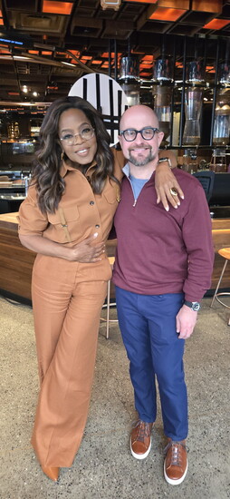 Kyle Woody with Oprah in 2025