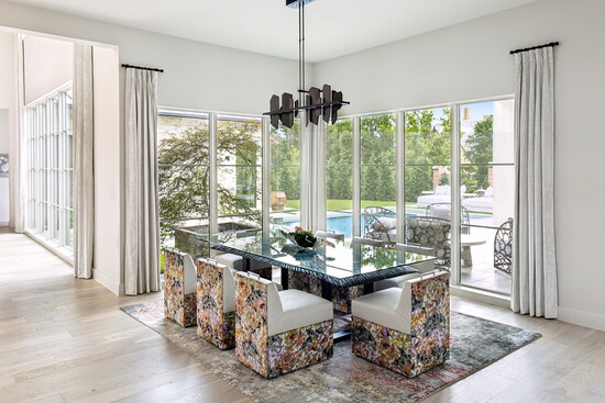 A light, airy dining space with lots of natural light and surroundings.