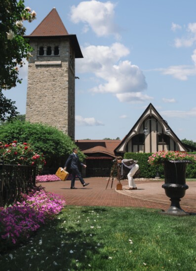 Chris Maduri and Zach Nagle, wearing designs from Daswani Clothiers, have fun with some of the photo props on the grounds of Saint Clements Castle