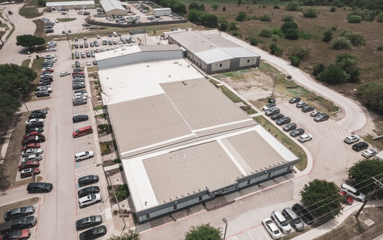 Aerial view of the Serve Denton Center at 306 N Loop 288, a 5-acre campus with 52,000 square feet of space supporting the work of 28 nonprofit organizations.