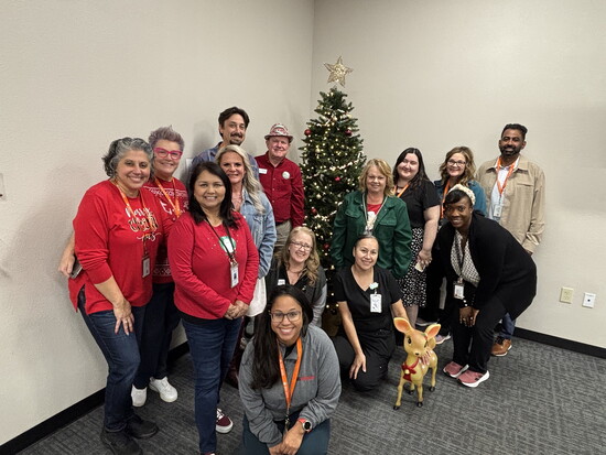 Nonprofit staff members at Serve Denton's annual Christmas celebration