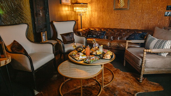 The Wine Room at Windsor Mill Tavern offers intimacy, flavor, and purpose - seating 10, with each reservation donated to a local charity.