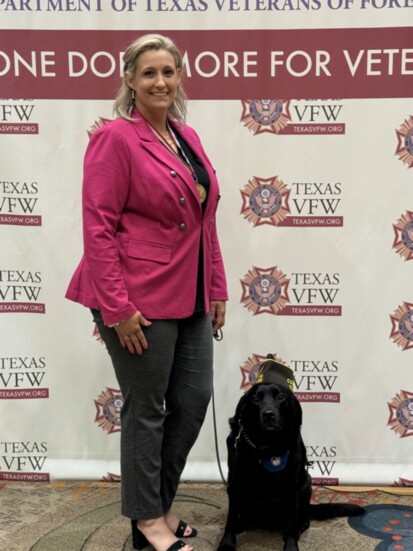 Commander Phillips with Beignet at the Texas VFW State Convention where she was recognized for service. 