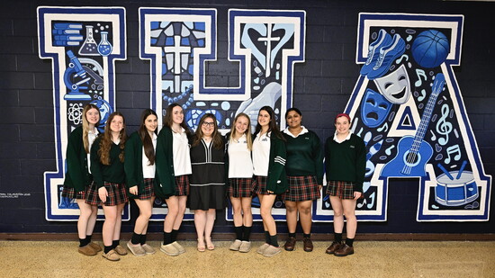 Members of the Campus Ministry Executive Board gathered with theology teacher and Campus Ministry Director Ms. Emily Ash.