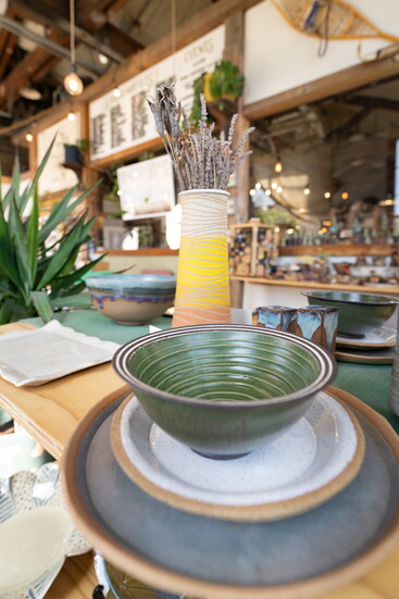 Handcrafted dishware of varying shapes, sizes and colors add beauty to your table and home. 