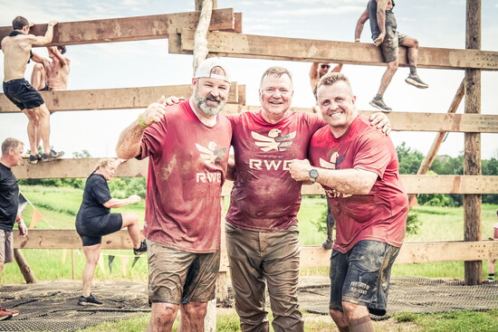 Rob Cordray (center) joined Team RWB colleagues Michael Salazar (left) and Dan Zirbes (right) at the June 2025 Twin Cities Tough Mudder obstacle course race 