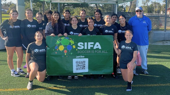 Smiles all around as SIFA alumni reunite on the field for an alumni game.