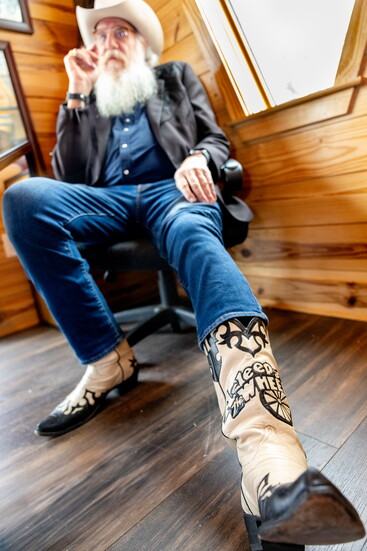 Benson shows off his custom 'Asleep at the Wheel' boots