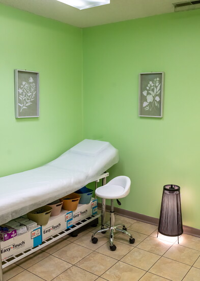 Warm, comfortable treatment room decor helps put clients at ease