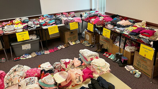 Clothes are sorted by size and gender, and kids' shoes are always popular. Photo: Dulles South Neighborhood Closet