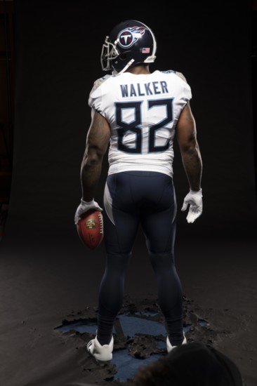 Tight End Delanie Walker shows off the back of the new Titans uniform.