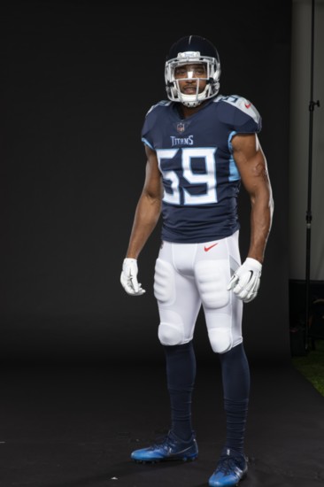 Linebacker Wesley Woodyard models the new Tennessee Titans uniform.