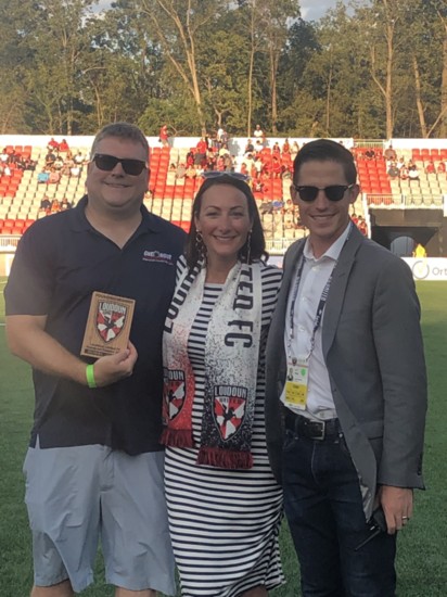 Shawn and Ashley Mitchell with Adam Behnke COO for Segra Field During the Loudoun United Opening Ceremony May 6, 2019