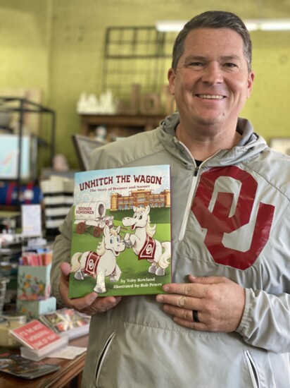 Oklahoma author Toby Rowland shows off his children's book "Unhitch The Wagon - The Story of Boomer and Sooner."