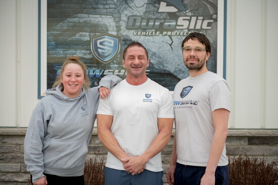 Owner Jarrel Ferrara (center) with Show Shine Detail and Reconditioning team members Holly Pinney (left) and Kyle Gomez (right).
