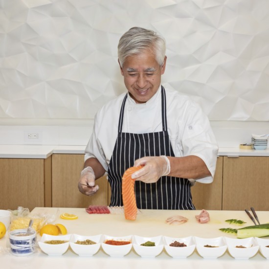 Chef Aik preps the salmon