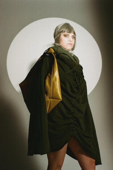 Emma Brego in the “Tether” dress and “Nodule” bag. Photo by Tadin Brego for *A LITTLE HOUSE FW24.