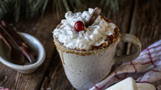 A hot chocolate bar featuring mugs with burnt sugar rims and an array of store-bought toppings and flavorings can be a simple way to entertain your guests. 