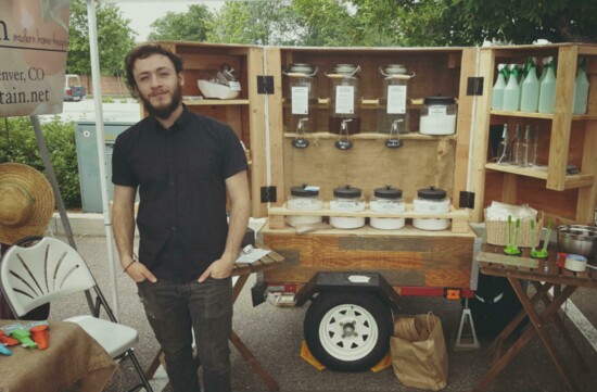 Nate Larsen pedals Ecomountain goods at the Cherry Creek farmer's market