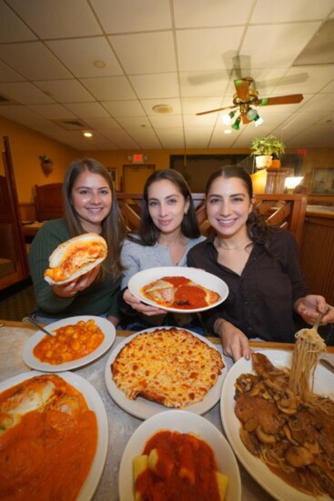 From L-R, Sara, Carly and Madison Shapiro enjoy Italian food at Pagliacci's Restaurant in Plainville. 
