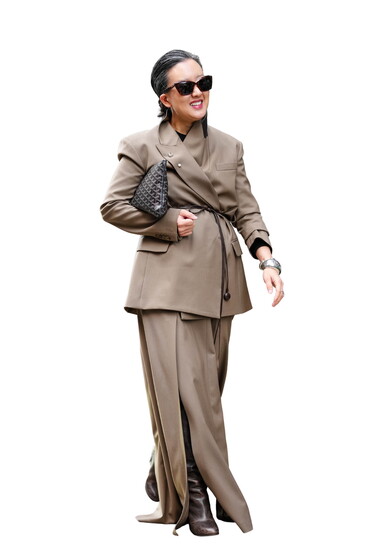 The Skirt Suit: Belted, vibrant, perfect for day or night. Photo by Edward Berthelot/Getty Images