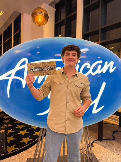 Celebrating his golden ticket 