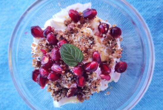 Pomegranite parfait with yogurt which is good for gut health.