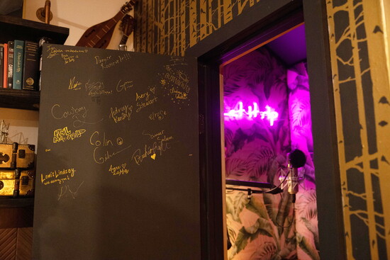 Signatures of artists who have recorded at Studio 601.