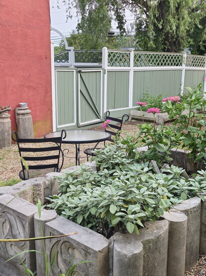 Outdoor seating area at Près Des Prés. Photo Credit: Trevor Joppich